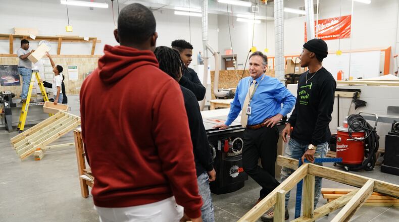 Fulton County Superintendent Mike Looney visits a woodshop class at the South Learning Center on Friday, December 13, 2019, in Atlanta. Fulton is the largest charter system in Georgia. (Elijah Nouvelage for The Atlanta Journal-Constitution)