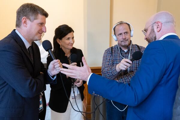 (Left to right) "Politically Georgia" podcast hosts Greg Bluestein and Patricia Murphy and producer Shane Backler interview State Sen. Josh McLaurin, D-Sandy Springs, at the Capitol in Atlanta on Monday.