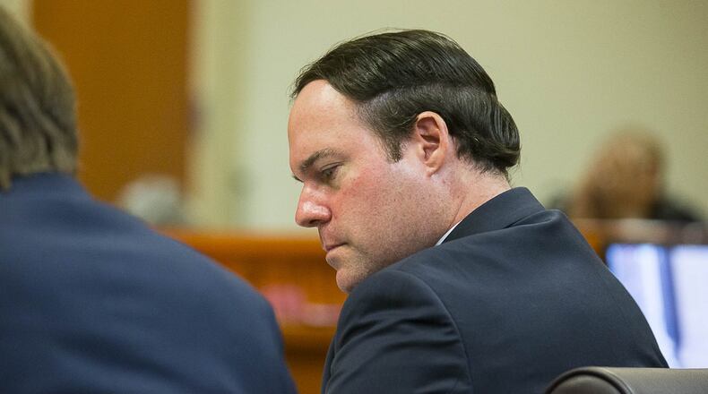 Georgia Department of Revenue attorney Alex Sponseller sits with his team in the courtroom of Judge Alan C. Harvey at the DeKalb County Courthouse in Decatur. The state Department of Revenue has appealed a decision regarding Fulton County’s decision to freeze property values. (ALYSSA POINTER/ALYSSA.POINTER@AJC.COM)