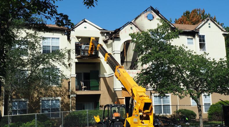 About 20 families were displaced from their homes after a fire blazed at the Grande Club apartments near Duluth. Now, five of the former tenants are filing a lawsuit against the owner and property manager. (Courtesy of Gwinnett County)