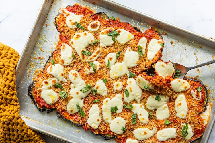 It’s possible to get eggplant Parmesan cooked in less than half an hour. You’ll just need to employ a sheet pan and your broiler. (Aaliyah Man for the AJC/food styled by Kate Williams)