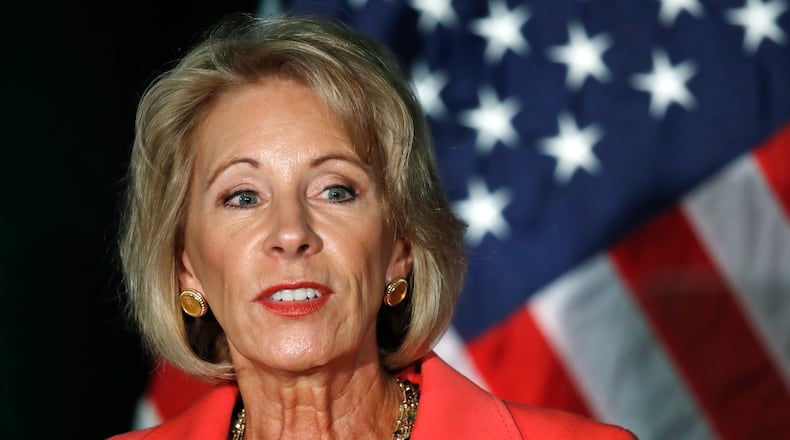Education Secretary Betsy DeVos speaks about campus sexual assault and enforcement of Title IX, the federal law that bars discrimination in education on the basis of gender, Thursday, Sept. 7, 2017, at George Mason University Arlington, Va., campus. (AP Photo/Jacquelyn Martin)