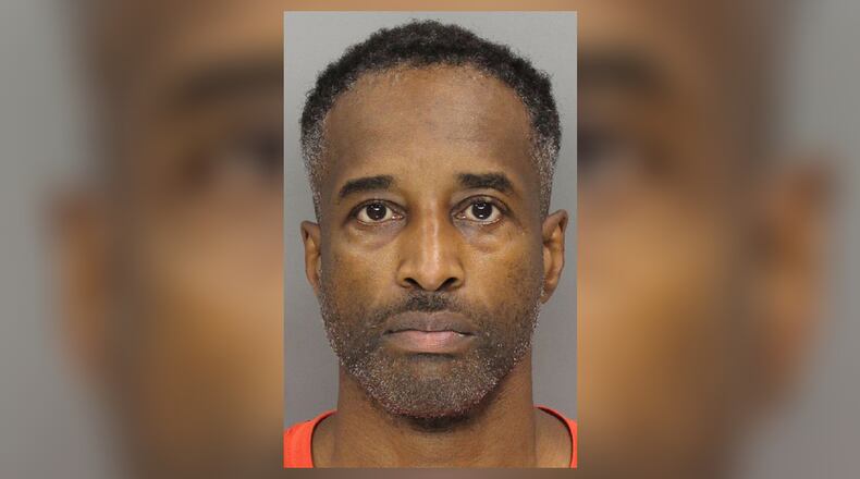 Garfield Norris, 52, was being held in the Cobb County jail without bond Monday.