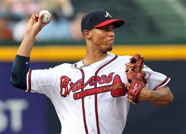 070212 ATLANTA: Braves shortstop Andrelton Simmons fields a ground ball by Cubs Starlin Castro for an out during first inning action at Turner Field in Atlanta on Monday, July 2, 2012. CURTIS COMPTON / CCOMPTON@AJC.COM Andrelton Simmons won the NL Platinum Glove last season as the best defensive player in the league.