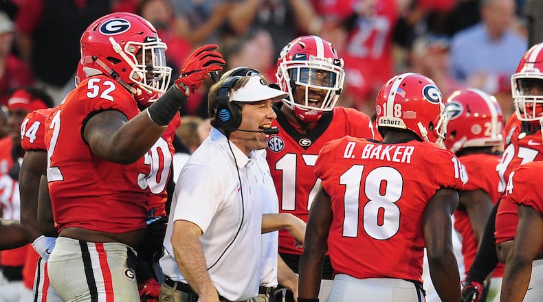 ATHENS, GA - NOVEMBER 4: Head Coach Kirby Smart of the Georgia Bulldogs celebrates with his players late in the game against the South Carolina Gamecocks after the game at Sanford Stadium on November 4, 2017 in Athens, Georgia. (Photo by Scott Cunningham/Getty Images)