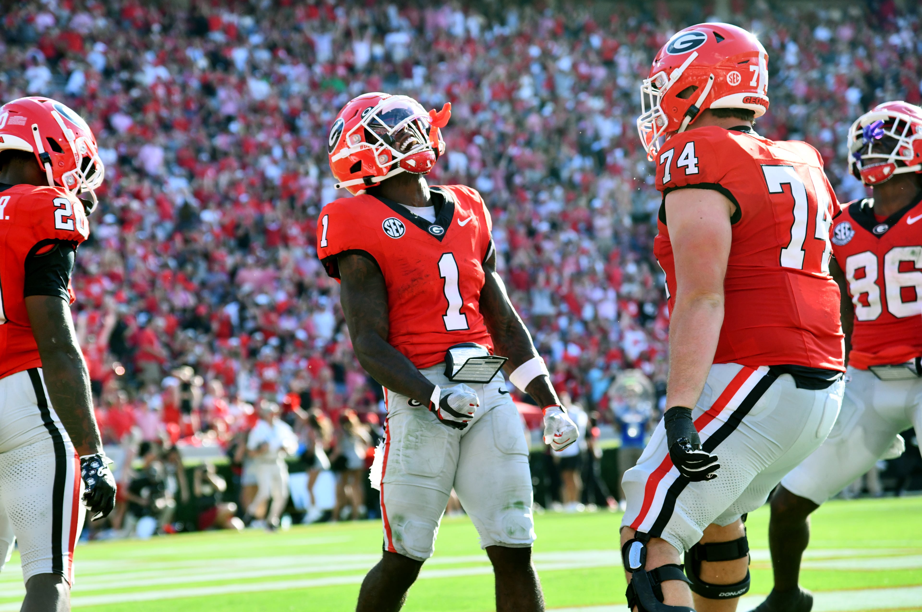 Georgia wide receiver Zachariah Branch (1) celebrates after scoring a touchdown during the second half in an NCAA football game at Sanford Stadium, Saturday, August 30, 2025, in Athens. Georgia won 45-7 over Marshall. (Hyosub Shin / AJC)