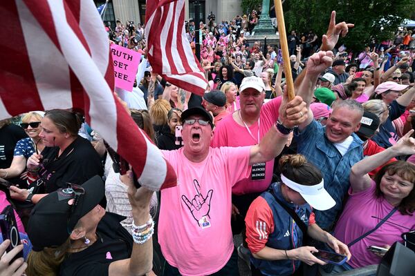 Supporters of Karen Read react after she was found not guilty of second-degree murder on Wednesday, June 18, 2025, in Dedham, Mass. (AP Photo/Josh Reynolds)