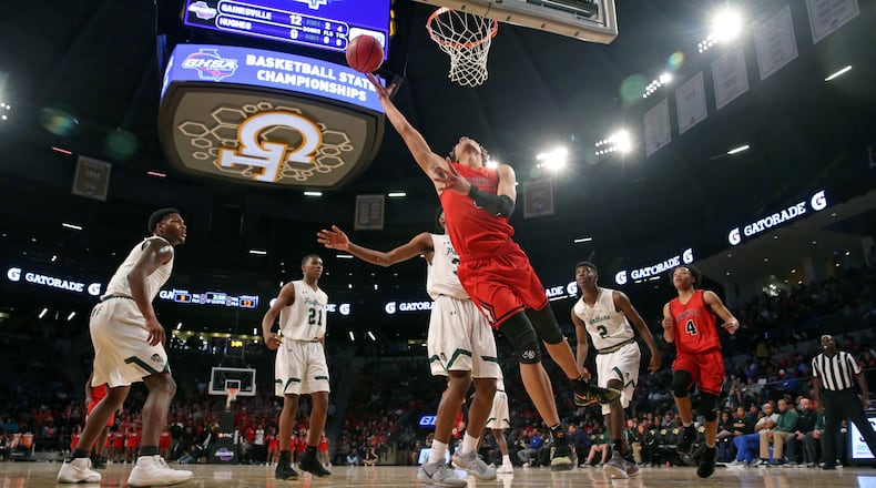 Gainesville forward KJ Buffen (5) attempts a basket during the first half of the GHSA Class AAAAAA Boys State Championship against Hughes at McCamish Pavilion Friday, March 9, 2018, in Atlanta.