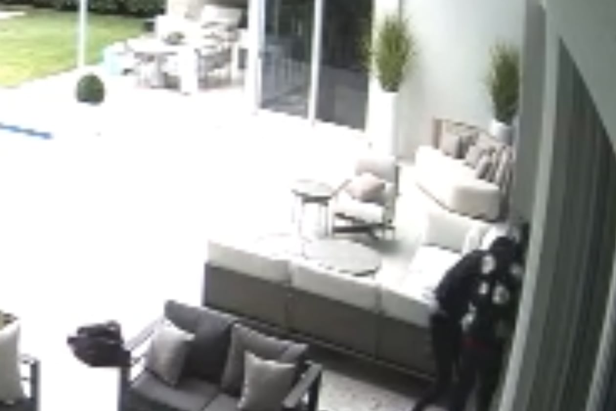 Video footage captured the incident and shows two suspects attempting to break into the Pinecrest, Fla., home. (Courtesy of the Pinecrest Police Department)