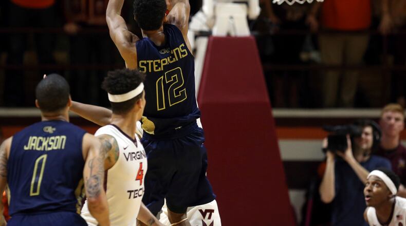 Georgia Tech’s Quinton Stephens (12) misses the last shot of the team’s NCAA college basketball game against Virginia Tech in Blacksburg Va., Wednesday, Jan. 18, 2017. Virginia Tech won 62-61. (Matt Gentry/The Roanoke Times via AP)