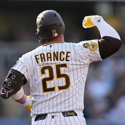 San Diego Padres' Ty France celebrates after hitting a home run during the third inning of a baseball game against the Atlanta Braves Wednesday, June 24, 2026, in San Diego. (AP Photo/Gregory Bull)