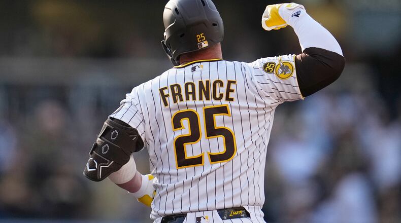 San Diego Padres' Ty France celebrates after hitting a home run during the third inning of a baseball game against the Atlanta Braves Wednesday, June 24, 2026, in San Diego. (AP Photo/Gregory Bull)