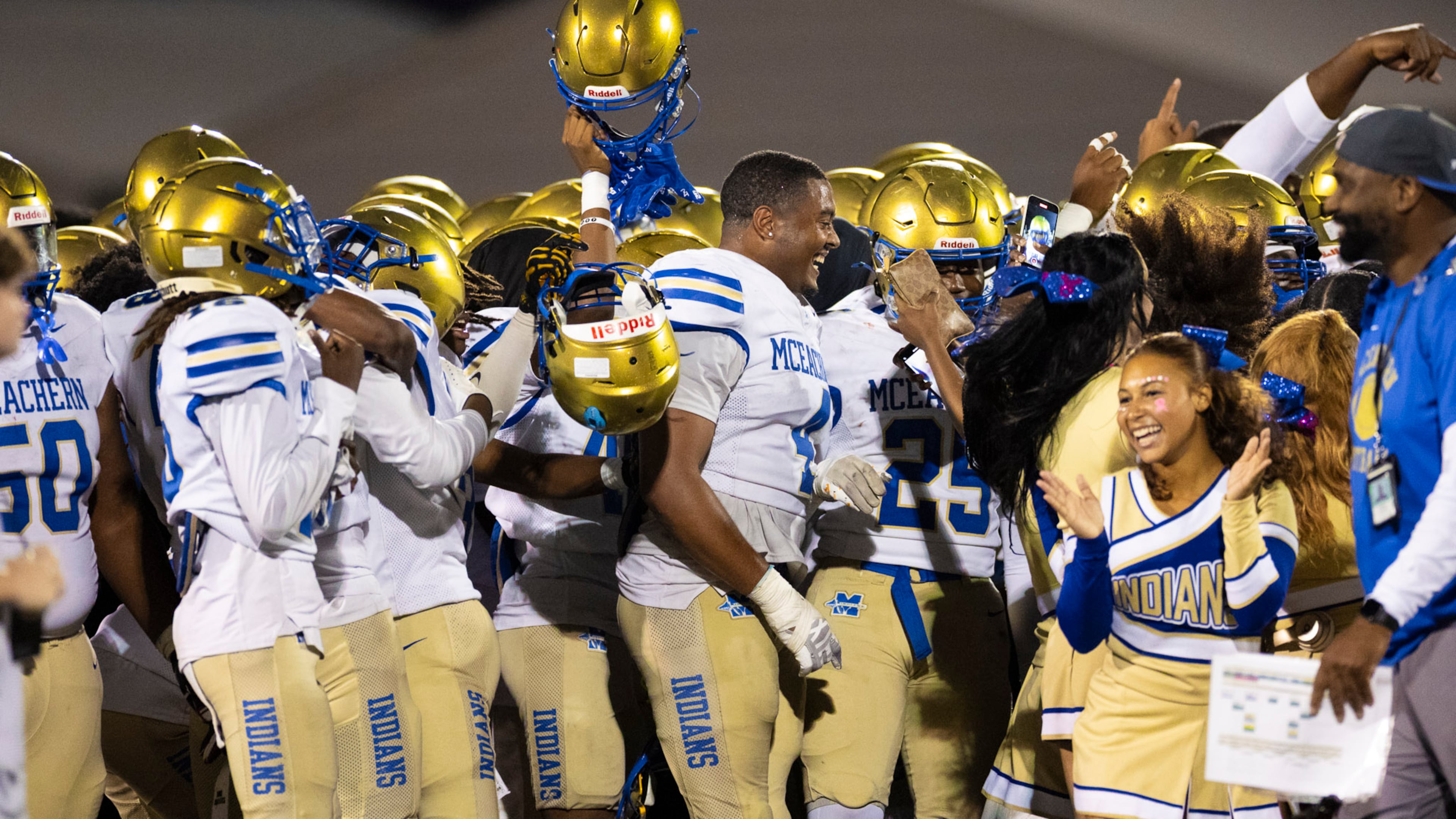 McEachern players celebrate their victory against Hillgrove at Cobb Energy Hillgrove Stadium in Powder Springs, GA on Friday, October 17th, 2025. (Oscar Guevara Saenz for the AJC)