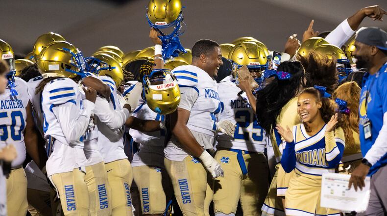 McEachern players celebrate their victory against Hillgrove at Cobb Energy Hillgrove Stadium in Powder Springs, GA on Friday, October 17th, 2025. (Oscar Guevara Saenz for the AJC)
