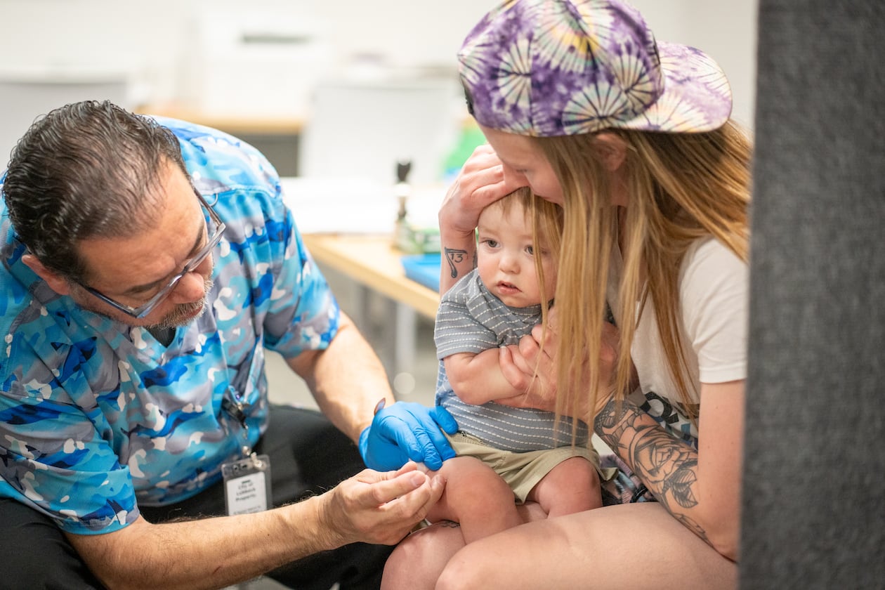 A 1-year-old receives the measles-mumps-rubella vaccine at a clinic in Texas. Of the nearly 2,000 U.S. measles cases reported this year, 93% of those who were infected were unvaccinated or their vaccination status was unknown, according to the Centers for Disease Control and Prevention. (Jan Sonnenmair/Getty Images)