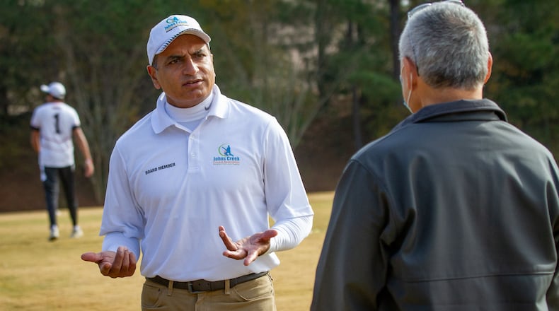 President of the Johns Creek Cricket Association Shafiq Jadvji talks with people on the sidelines before the start of the match between Lambert High School and Northview High School at Shakerag Park in Johns Creek Sunday, November 6, 2020. STEVE SCHAEFER FOR THE ATLANTA JOURNAL-CONSTITUTION