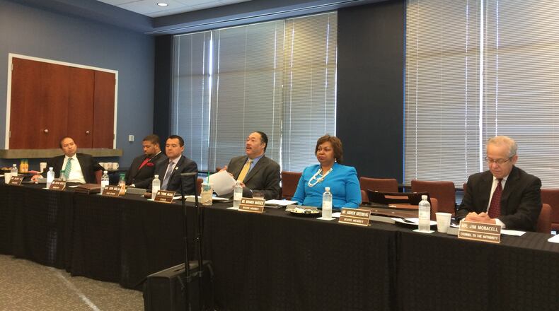 The Decide DeKalb Development Authority board voted unanimously Oct. 8 to approve bond financing deals to support the Perimeter Summit and Source One projects. MARK NIESSE / MARK.NIESSE@AJC.COM