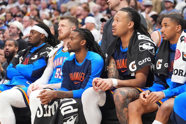 From left, Oklahoma City Thunder guard Luguentz Dort, center Isaiah Hartenstein, guard Cason Wallace, forward Jaylin Williams and guard Aaron Wiggins look on from the bench as time runs out in the second half of Game 6 in the Western Conference semifinals of the NBA basketball playoffs against the Denver Nuggets Thursday, May 15, 2025, in Denver. (AP Photo/David Zalubowski)