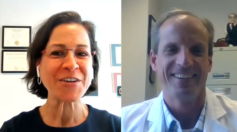 The day after the U.S. Food and Drug Administration authorized the Pfizer-BioNTech COVID-19 vaccine for adolescent children, pediatrician scientists at Emory University and Children’s Healthcare of Atlanta answered questions about the vaccine in an online press event. Seen here, Dr. Andi Shane, MD, chief of the division of pediatric infectious diseases at Emory University School of Medicine and medical director of infectious disease at Children’s Healthcare of Atlanta, and Dr. Evan Anderson, MD, professor of medicine and pediatrics at Emory University School of Medicine and pediatric infectious diseases specialist at Children’s Healthcare of Atlanta, participate in the event Tuesday, May 11, 2021. (Screenshots taken by Ariel Hart / The Atlanta Journal-Constitution.)