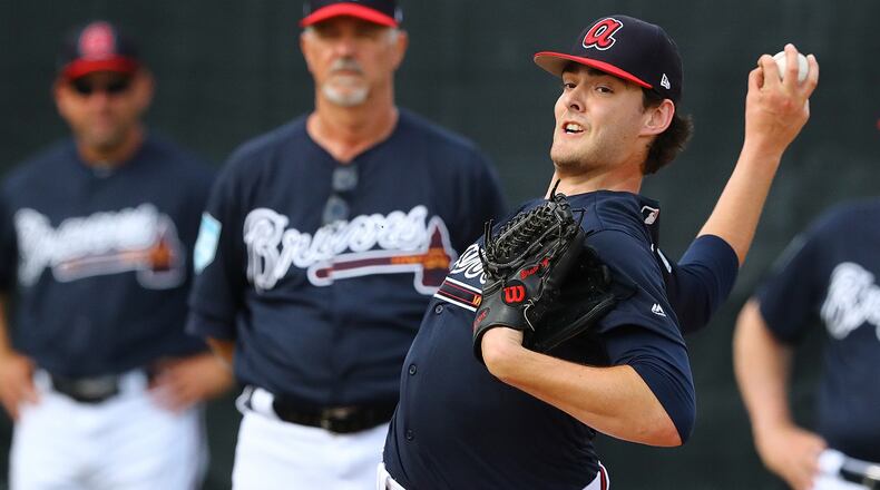 Braves pitching coach Rick Kranitz watches pitcher Ian Anderson work in the bullpen during spring training at the ESPN Wide World of Sports Complex on Wednesday, Feb. 20, 2019, in Lake Buena Vista. Curtis Compton/ccompton@ajc.com