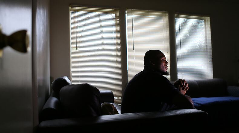 Left behind in the new world of health care Anthony Jenkins, 32, sits alone and unemployed in the living room of his sparsely supplied apartment on Wednesday, March 19, 2014, in Atlanta. Jenkins can't hold a steady job because of a seizure disorder. His last employer had to let him go for liability reasons after he suffered his second seizure while on the job. He doesn't make enough money to qualify for federal subsidies through the Health Insurance Marketplace and is being allowed to live in his apartment temporarily pending qualification for disability payments. CURTIS COMPTON / CCOMPTON@AJC.COM