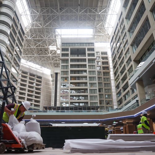 Workers continue construction inside The Center, formerly CNN Center, in Atlanta on March 30, 2026. (Arvin Temkar/AJC)