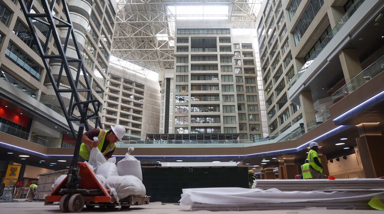 Workers continue construction inside The Center, formerly CNN Center, in Atlanta on March 30, 2026. (Arvin Temkar/AJC)