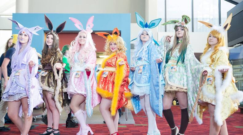 Cosplayers assemble for a picture at a previous MomoCon convention.