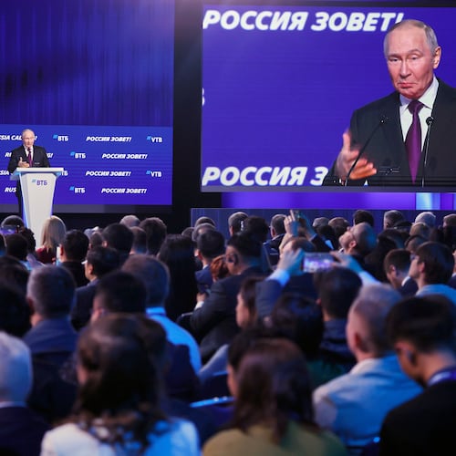 Russian President Vladimir Putin gestures while speaking at the plenary session of the VTB "Russia Calling" Investment forum in Moscow, Tuesday, Dec. 2, 2025. (Sergei Ilnitsky/Pool Photo via AP)