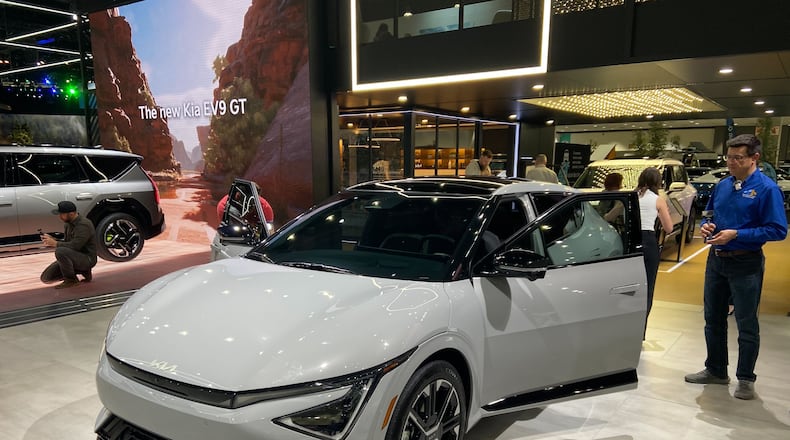 The 2025 Kia EV6 is displayed on the floor of the Los Angeles Auto Show. (Zachary Hansen/AJC)