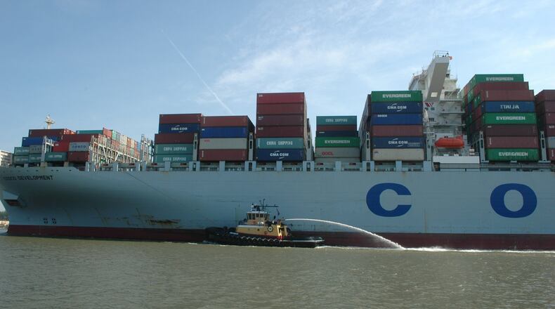 A pilot craft guides the Cosco Development, then the largest container ship to ever call on an East Coast port, as it plies through the Savannah River en route to the Garden City Terminal on the Savannah River on May 11, 2017. J. Scott Trubey/strubey@ajc.com