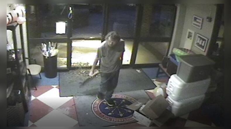 DeKalb County police are looking for a person of interest after a fire at St. Martin's Episcopal School. (Credit: Channel 2 Action News)