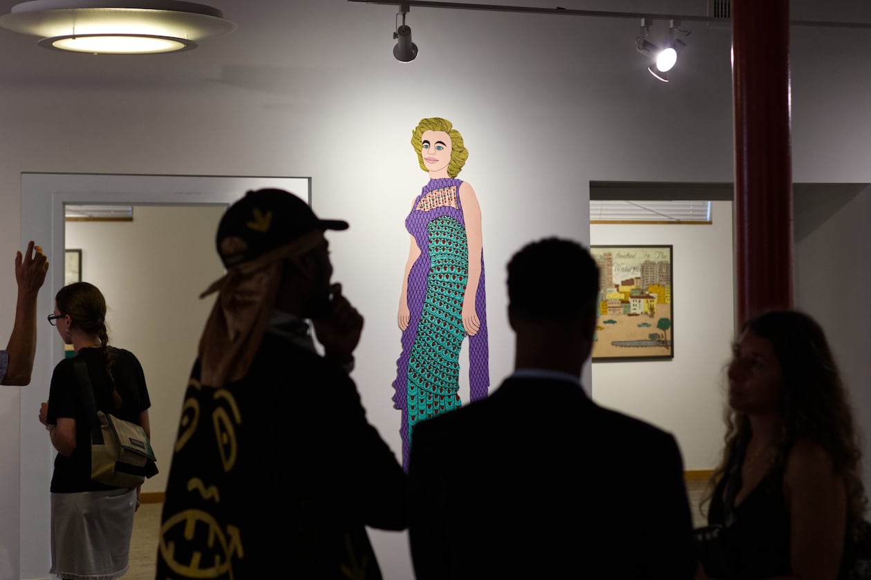 Works by renowned folk artists Howard Finster (including the 73-inch-tall Marilyn Monroe painted wooden cutout)  and Harry Underwood are on view at the Sun ATL in the exhibition "The Art of Belief" through Nov. 15. (Photo by Dustin Timbrook)