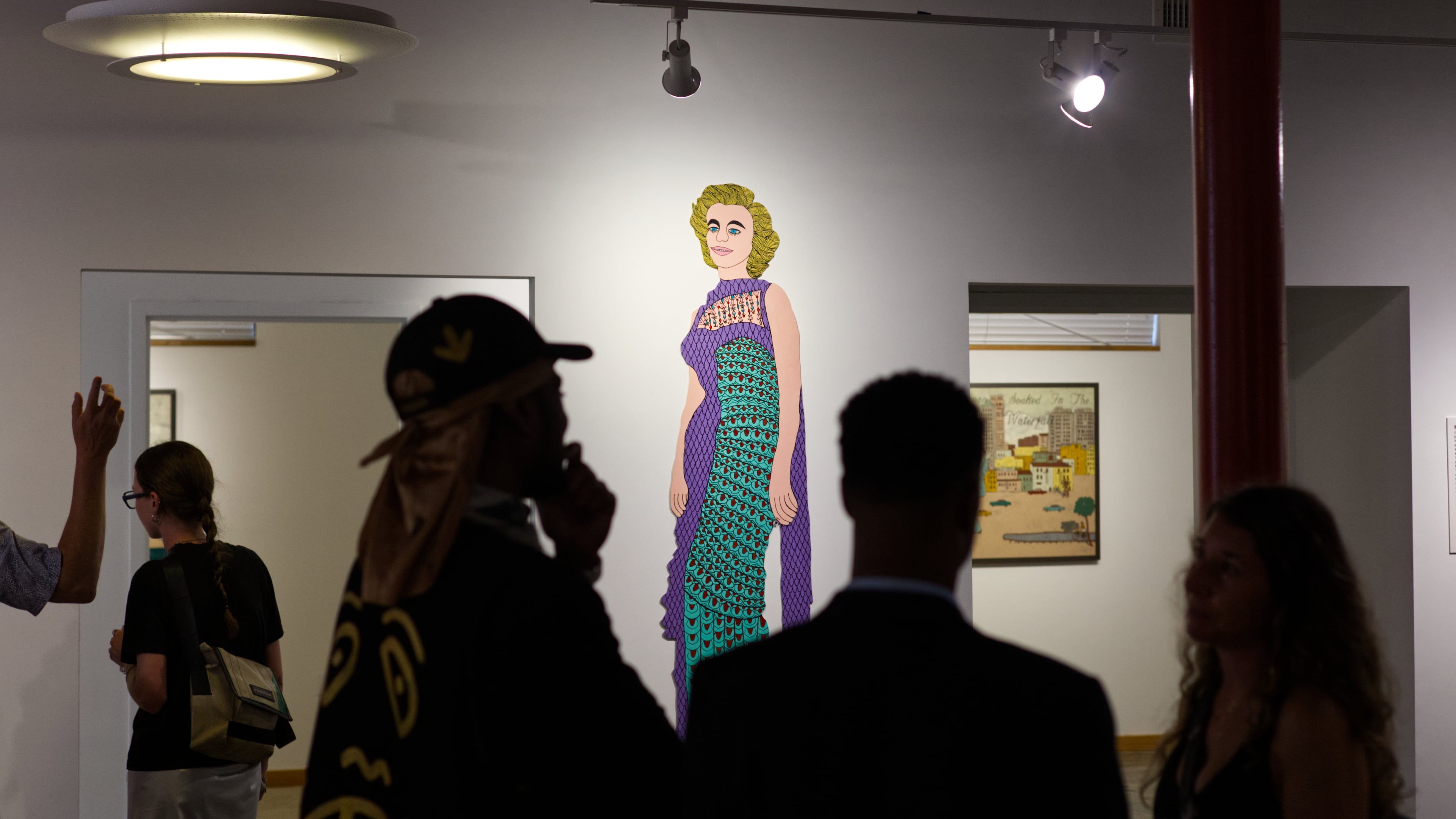 Works by renowned folk artists Howard Finster (including the 73-inch-tall Marilyn Monroe painted wooden cutout) and Harry Underwood are on view at the Sun ATL in the exhibition "The Art of Belief" through Nov. 15. (Photo by Dustin Timbrook)