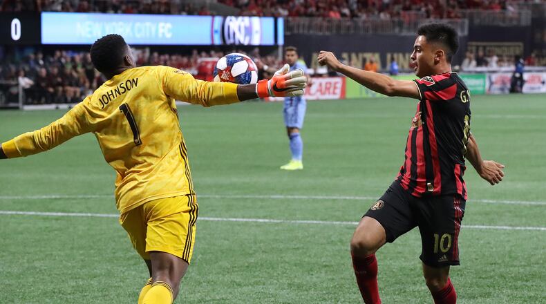 August 11, 2019 Atlanta: New York City FC goalkeeper Sean Johnson blocks a shot by Atlanta United midfielder Pity Martinez in their soccer match on Sunday, August 11, 2019, in Atlanta.   Curtis Compton/ccompton@ajc.com