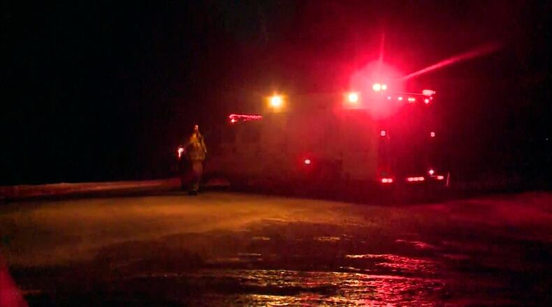 In this image taken from video, emergency services are near the scene of a bus crash carrying the Humboldt Broncos of the Saskatchewan Junior Hockey League, near Nipawin, Canada.