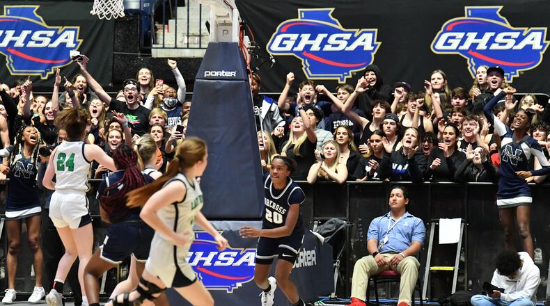 March 12, 2022 Macon - Norcross' Zaria Hurston (20) reacts after scoring at the end of the 4th quarter during the 2022 GHSA State Basketball Class AAAAAAA Girls Championship game at the Macon Centreplex in Macon on Saturday, March 12, 2022. Norcross won 41-37 over Harrison. (Hyosub Shin / Hyosub.Shin@ajc.com)
