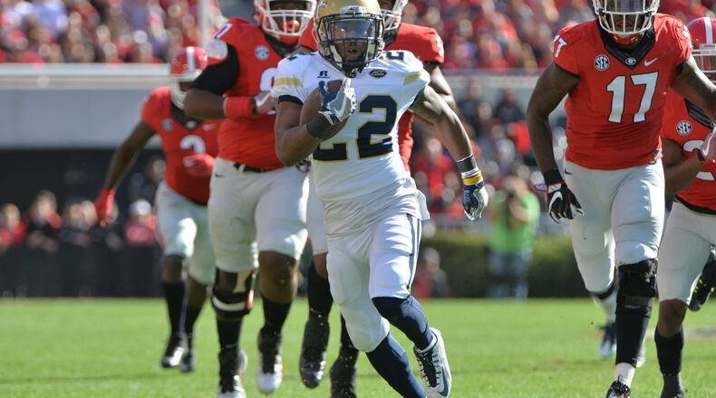Georgia Tech running back Clinton Lynch (22) runs for a touchdown against Georgia at Sanford Stadium on Saturday, November 26, 2016. HYOSUB SHIN / HSHIN@AJC.COM
