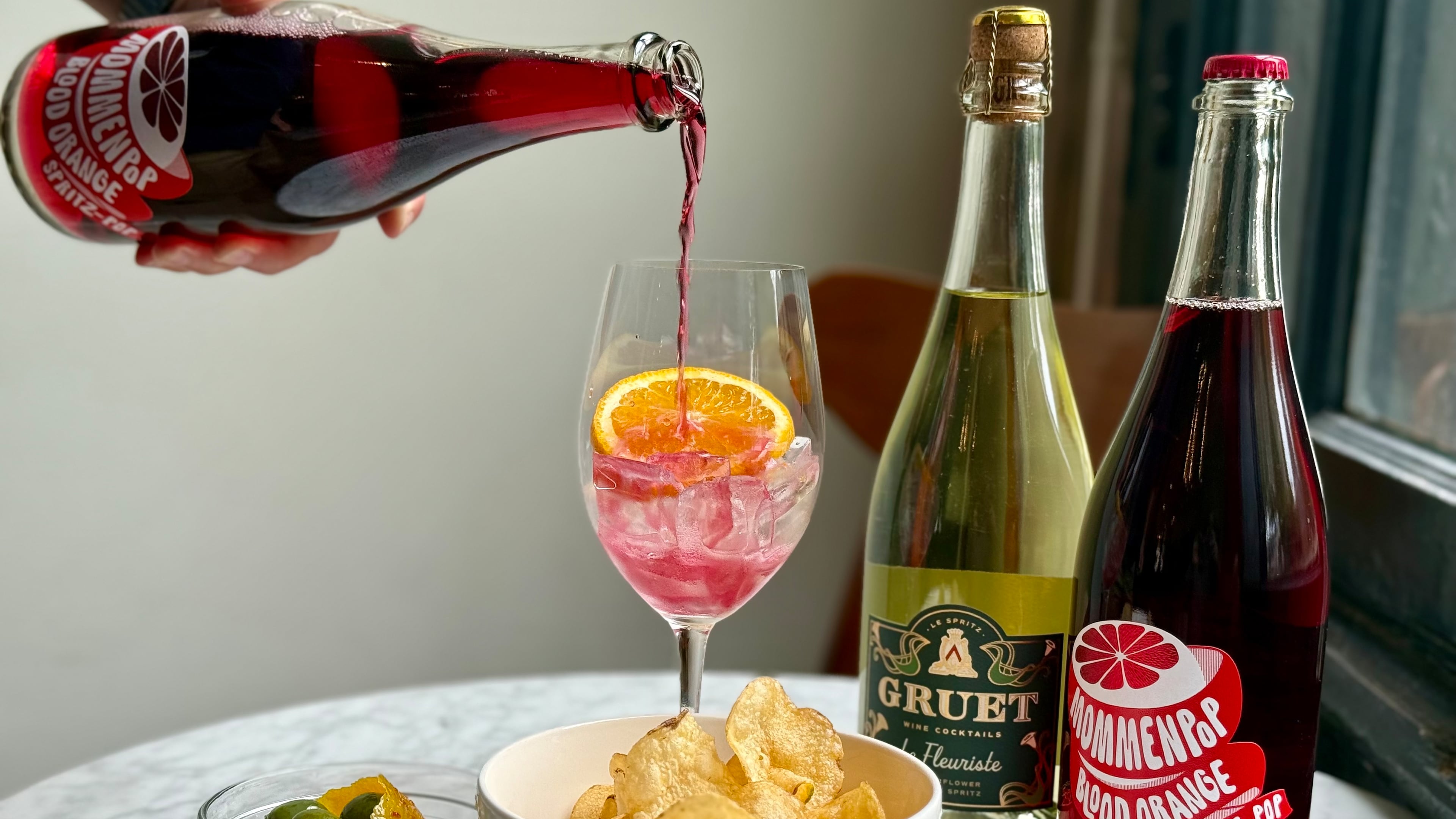 The spritz has become so popular that wine producers are bottling ready-to-drink versions of the cocktail. (Krista Slater for the AJC)