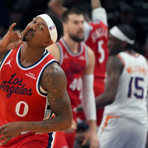 Los Angeles Clippers guard Bradley Beal celebrates a made 3-pointer against the Phoenix Suns during the first half of an NBA basketball game Thursday, Nov. 6, 2025, in Phoenix. (AP Photo/Ross D. Franklin)
