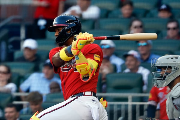Atlanta Braves' Ronald Acuña Jr. hits a single during the first inning of a baseball game against the Boston Red Sox, Friday, May 30, 2025, in Atlanta. (AP Photo/Butch Dill)