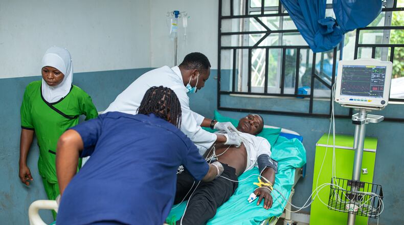Doctors attend to a victim of a locally brewed alcoholic concoction commonly known as "Monkey Tail" at a hospital in Odigbo southern Nigeria, Thursday, Sept. 17, 2026. (AP Photo/Dapo Alley)