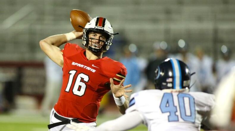 October 30, 2015 - Norcross, Ga: GAC quarterback Davis Mills (16) attempts a pass in the second half of their game against Lovett at Greater Atlanta Christian Friday in Norcross, Ga., October 30, 2015. GAC won 34-7. PHOTO / JASON GETZ GAC quarterback Davis Mills (16) attempts a pass in the second half of their game against Lovett at Greater Atlanta Christian Friday in Norcross, Ga., October 30, 2015. GAC won 34-7. (Jason Getz/AJC)