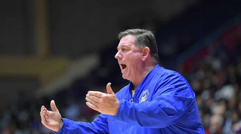 McEachern boys basketball coach Mike Thompson this season led his team to a 32-0 finish in Georgia and the Class AAAAAAA championship, the school’s first in boys basketball. HYOSUB SHIN / HSHIN@AJC.COM