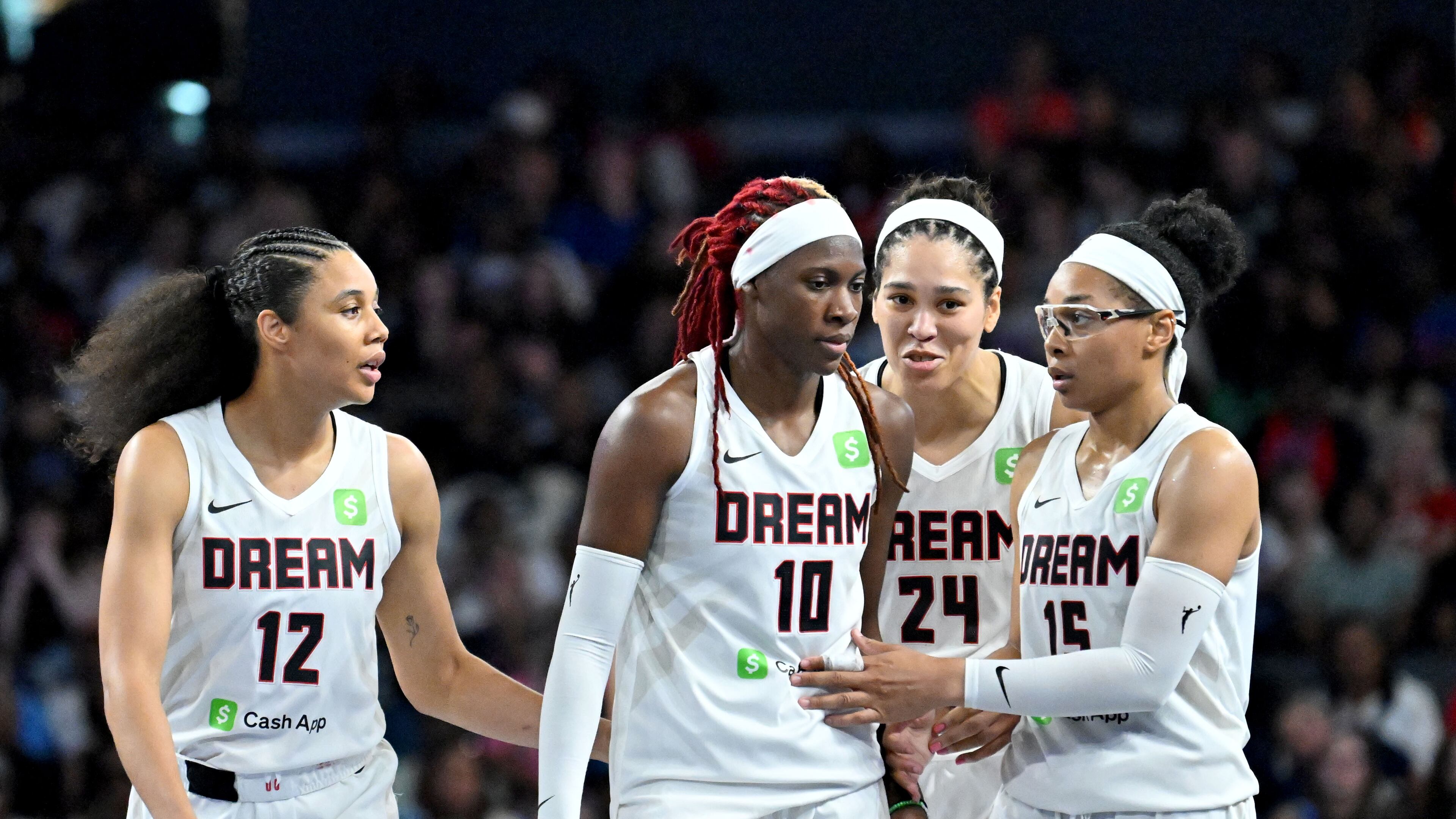 Atlanta Dream guard Rhyne Howard (10) is celebrated by teammates during the second half in a WNBA basketball game at Gateway Center Arena, Saturday, May 24, 2025, in Atlanta. Atlanta Dream won 83-75 over Dallas Wings. (Hyosub Shin / AJC)