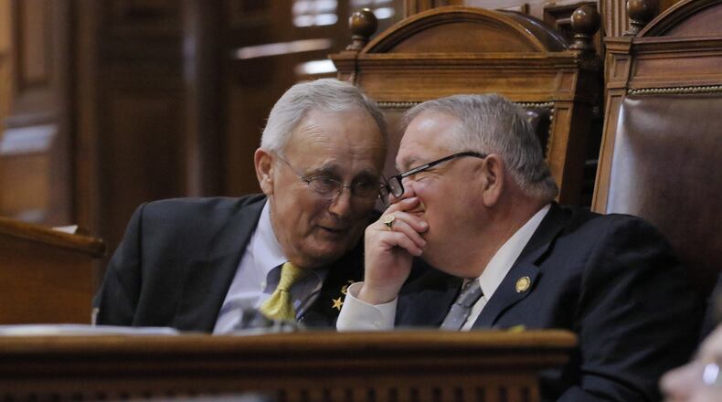 House Rules Committee Chairman John Meadows confers with House Speaker David Ralston during session earlier this week. BOB ANDRES /BANDRES@AJC.COM