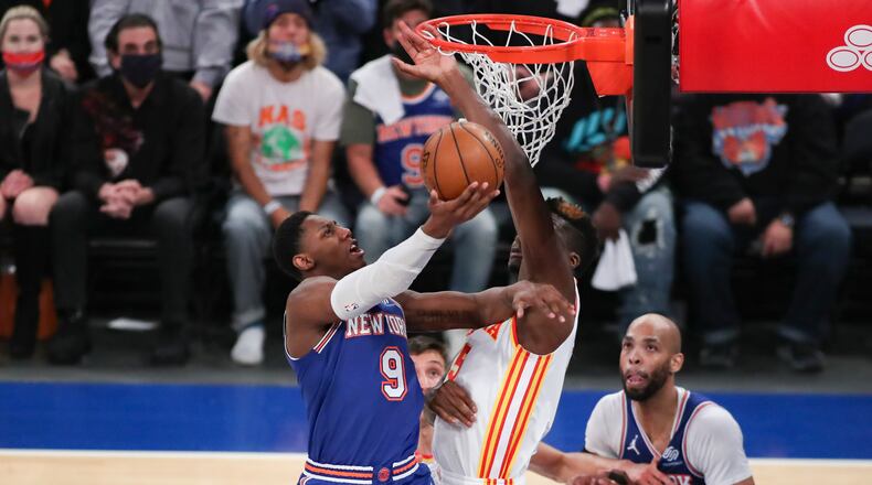 The Hawks Clint Capela meets New York Knicks guard RJ Barrett at the rim Wednesday. (Wendell Cruz/Pool Photo via AP)