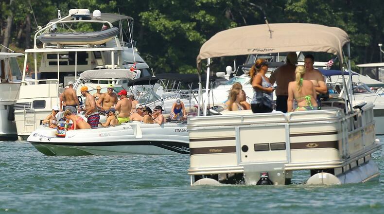 Four people died on Georgia’s lakes and rivers over the Fourth of July weekend and 29 people were charged with boating under the influence.