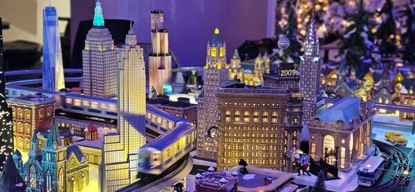 The Neighborhood Christmas Train Experience includes six running Lionel trains, more than 300 houses, churches, mountain-top chalets, diners, an amusement park and even a Home Depot. (Photo Courtesy of the Galucki family)