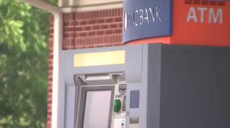 A man was robbed using this Sandy Springs ATM on Roswell Road, police say.
